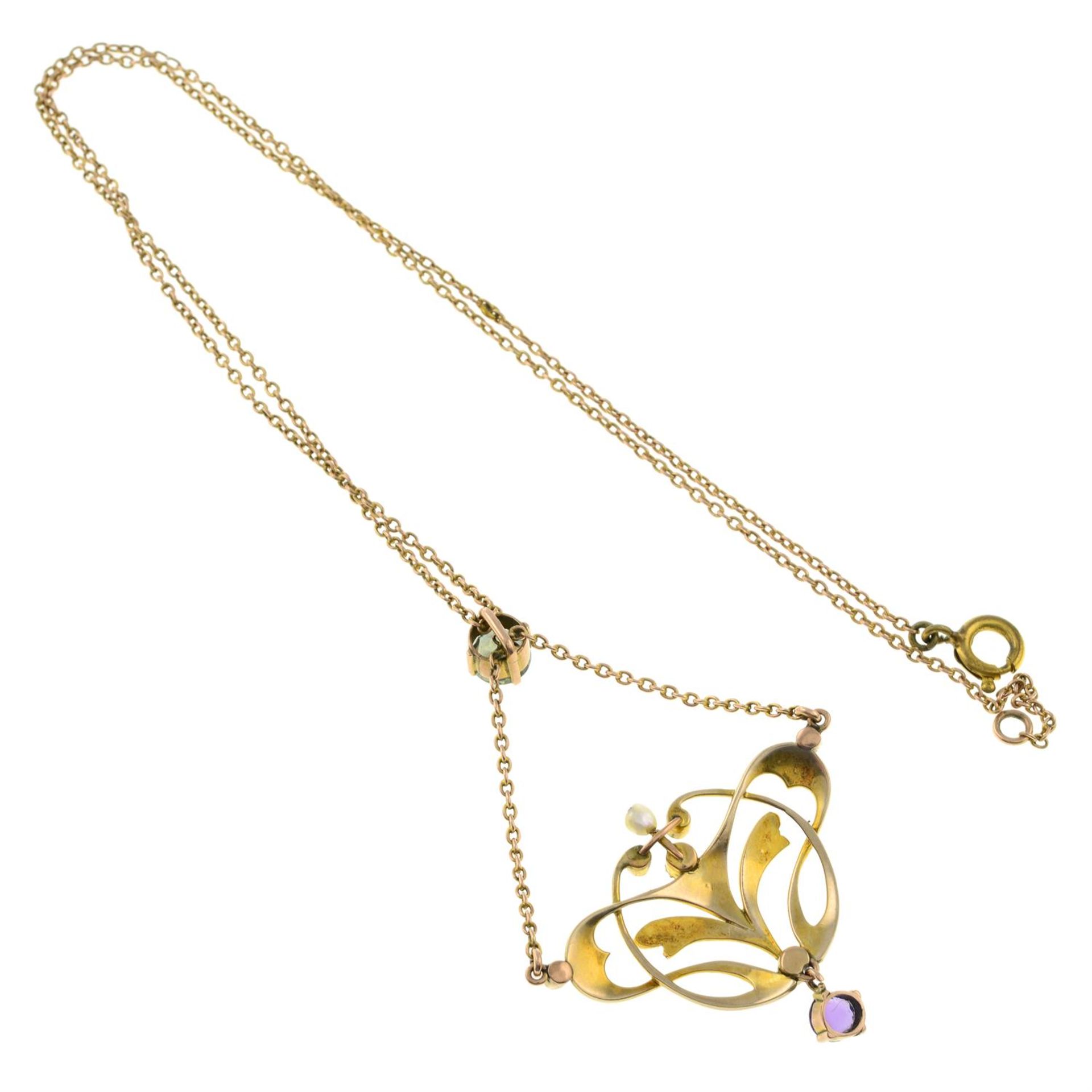 An Art Nouveau gold amethyst, peridot and split pearl pendant, on integral chain. - Image 2 of 2