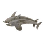 A dolphin brooch, by Georg Jensen.