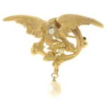 A 19th century gold dragon brooch, with split pearl highlights and a cultured pearl drop.