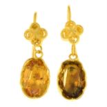 A pair of citrine drop earrings.