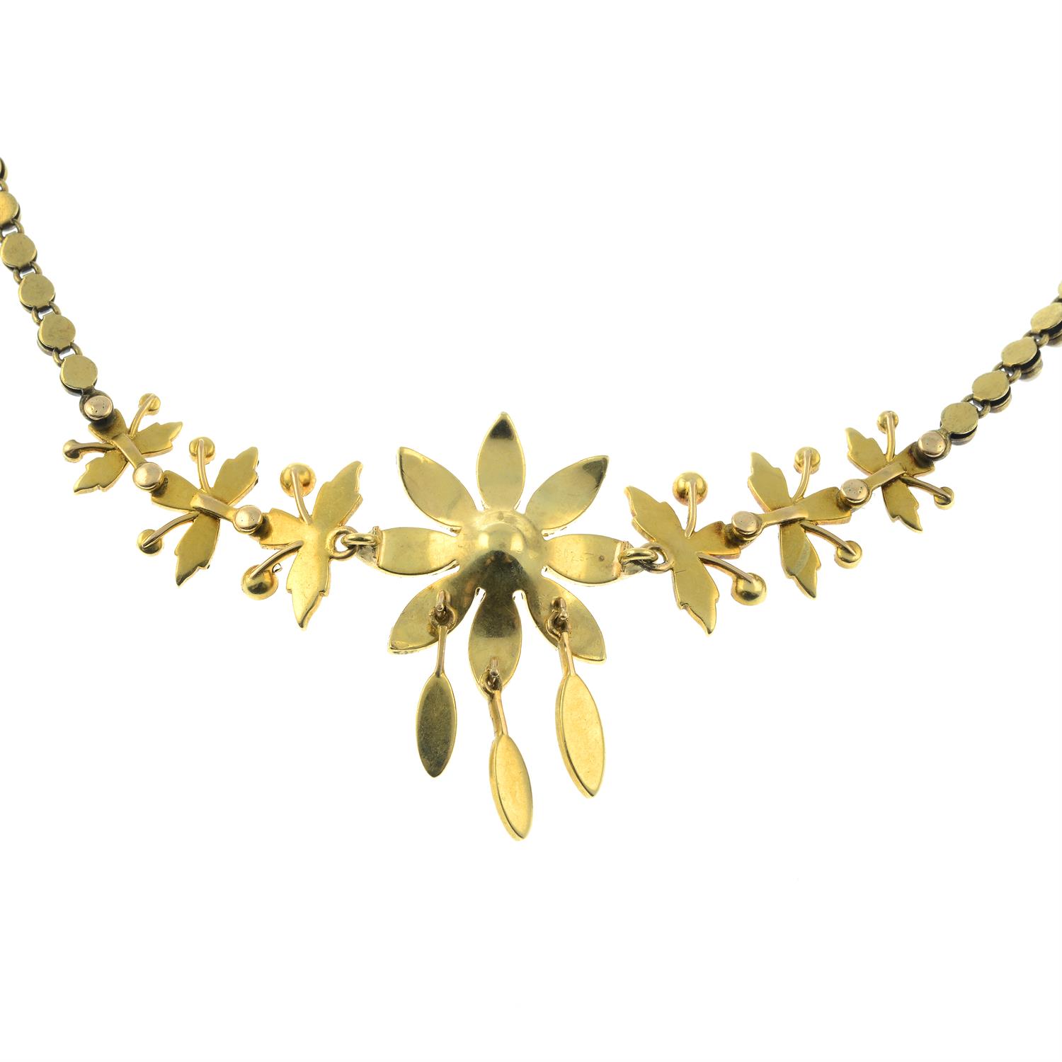 An early 20th century gold seed pearl and split pearl floral necklace. - Image 2 of 3