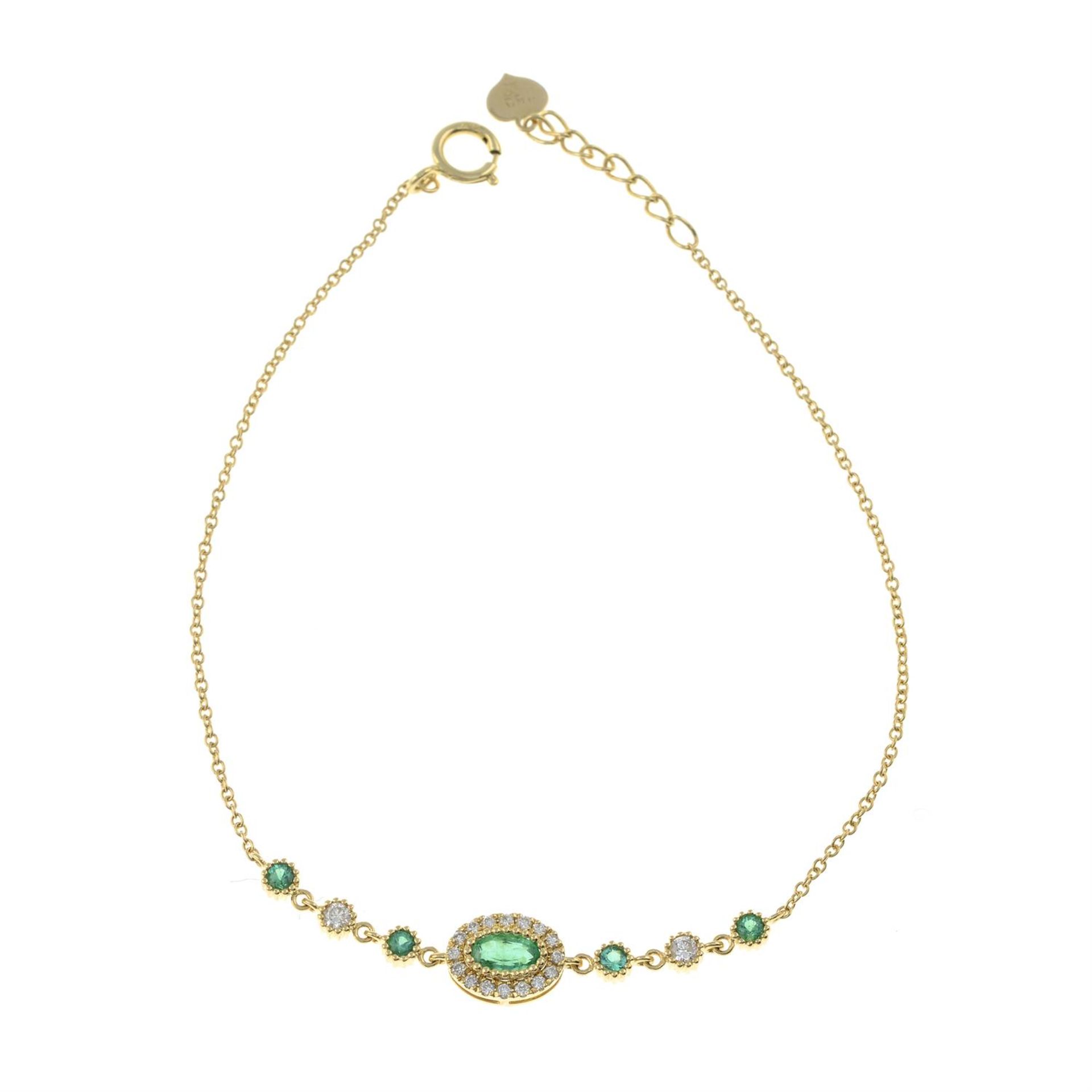 An 18ct gold emerald and diamond bracelet.