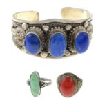 A selection of jewellery, to include a lapis lazuli bangle, together with a coral ring,