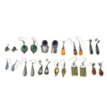 Eleven pairs of gem-set earrings and a pendant.