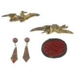 A small selection of Chinese jewellery, to inlcude three brooches and a pair od drop earrings.