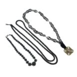 Three mourning necklaces, to include two vulcanite necklaces and one glass bead necklace.