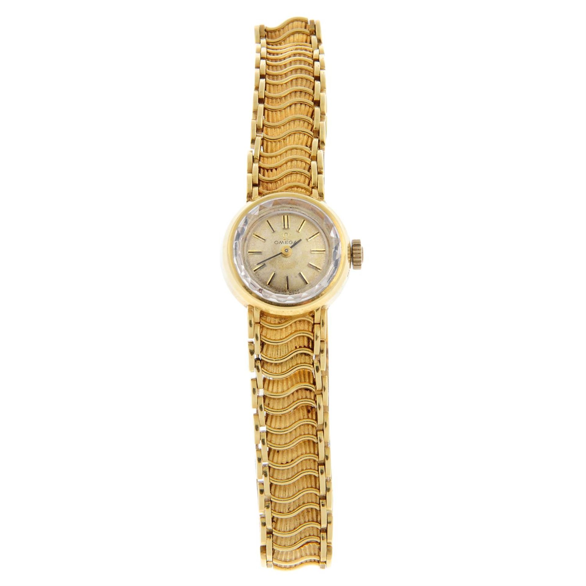OMEGA - an 18ct yellow gold bracelet watch, 17mm.