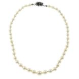 A graduated cultured pearl necklace with a rose-cut diamond clasp.