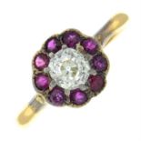 An Edwardian gold old-cut diamond and ruby cluster ring.