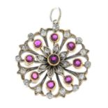 An Edwardian gold and silver, ruby and old-cut diamond floral cluster pendant.