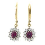 A pair of ruby and brilliant-cut diamond drop earrings.