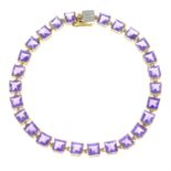 A 9ct gold amethyst line bracelet.