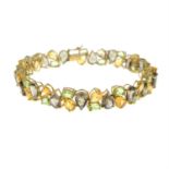 A citrine, smokey quartz and peridot bracelet.