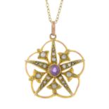 An Edwardian 9ct gold amethyst and split pearl pendant, with chain.