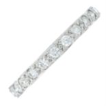 A brilliant-cut diamond eternity ring.