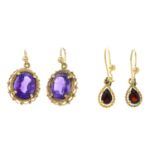 A pair of 9ct gold amethyst drop earrings together with a pair of garnet drop earrings.