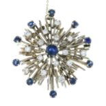 A brilliant-cut diamond and sapphire spray brooch.