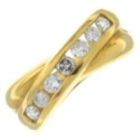 An 18ct gold brilliant-cut diamond band ring.