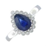 A sapphire and brilliant-cut diamond pear-shape cluster ring.