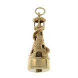 A 9ct gold lighthouse pendant / charm.