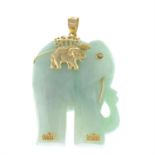 A 9ct gold jade elephant pendant.