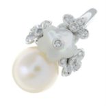 An 18ct gold cultured pearl, diamond and mother-of-pearl floral dress ring.