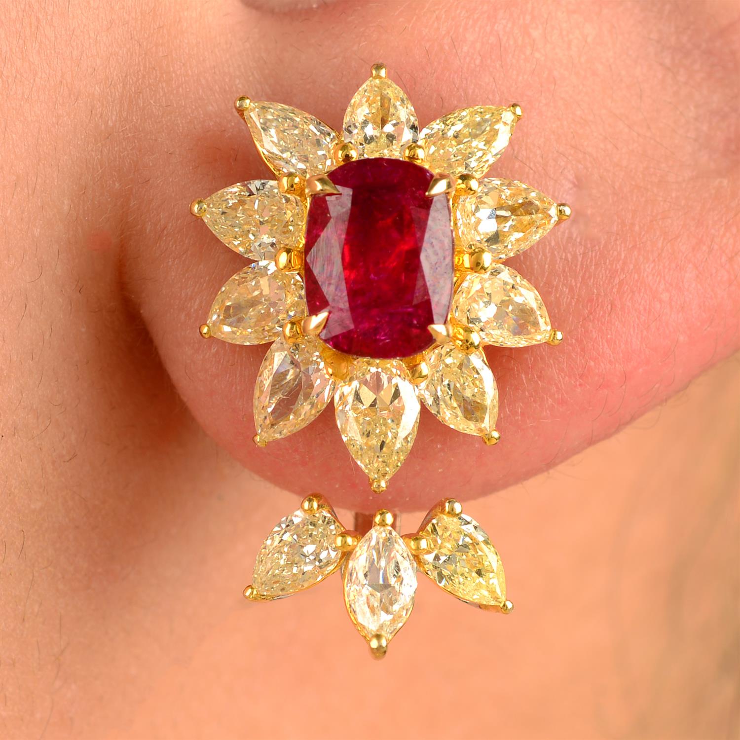 A pair of 'pigeon's blood' Burma ruby and pear-shape diamond cluster earrings, with marquise and