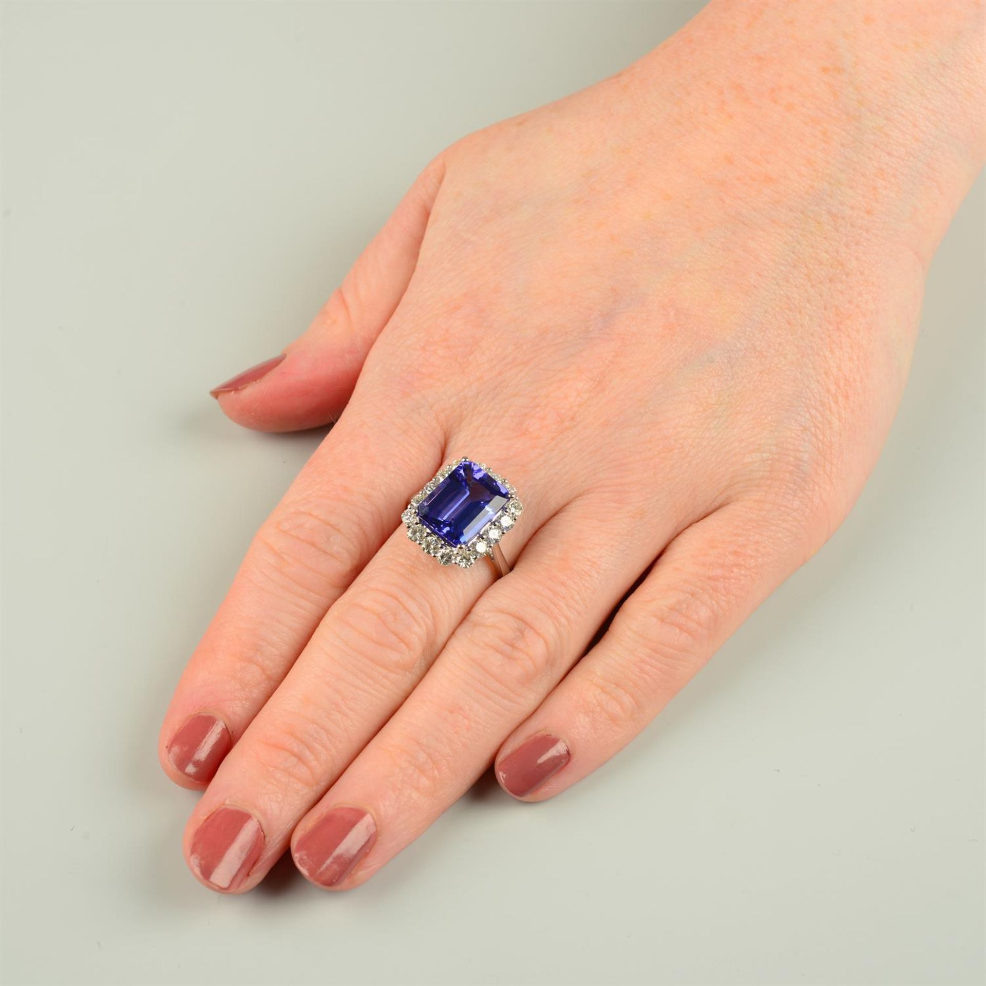 An 18ct gold tanzanite and brilliant-cut diamond cluster ring. - Image 5 of 5