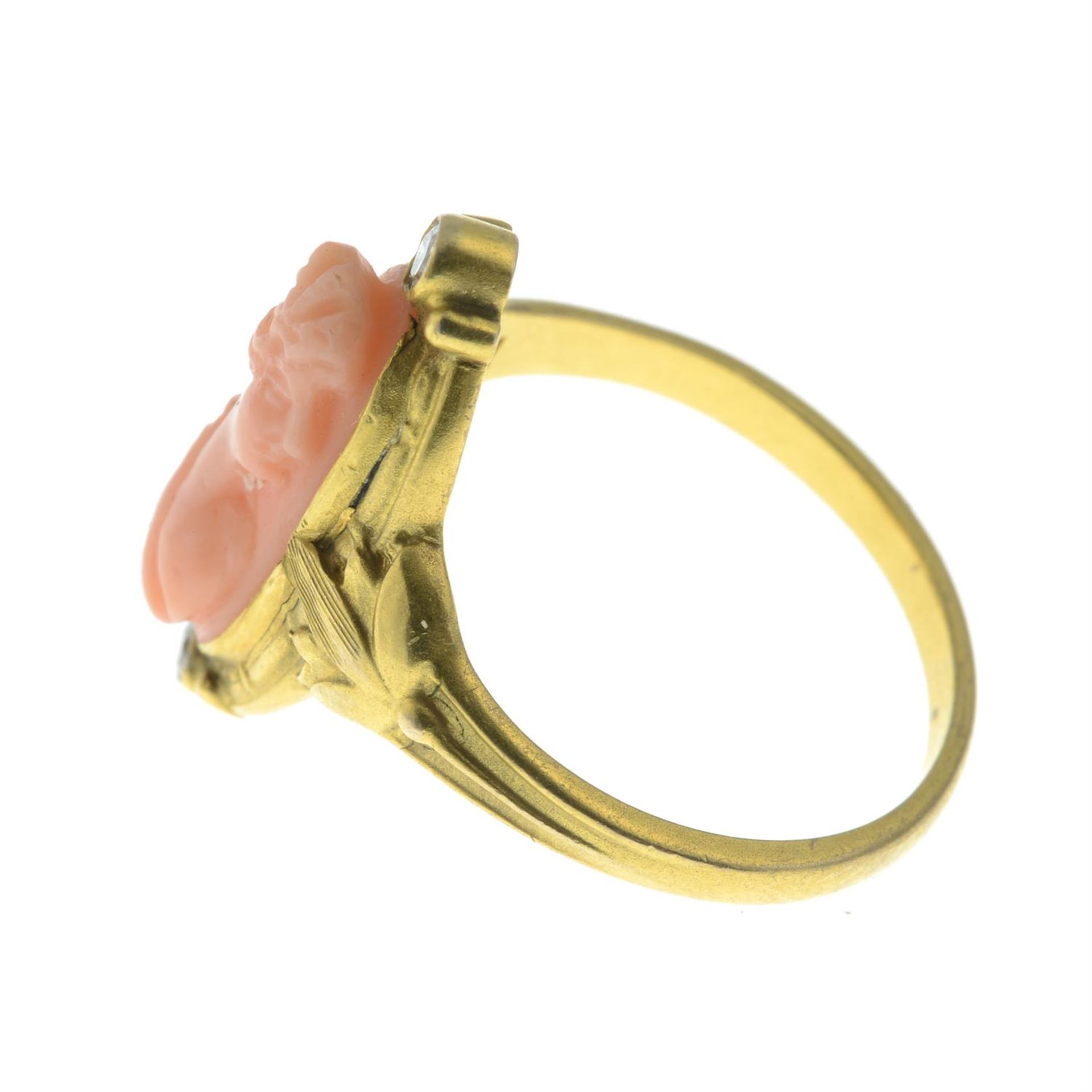 An early 20th century gold, coral cameo and circular-cut diamond ring, with foliate shoulders. - Image 3 of 5