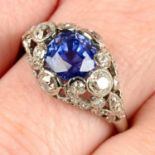 A sapphire and vari-cut diamond dress ring.