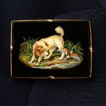 A 19th century micro mosaic brooch, depicting a dog and duck at the lakeside, within a 9ct gold