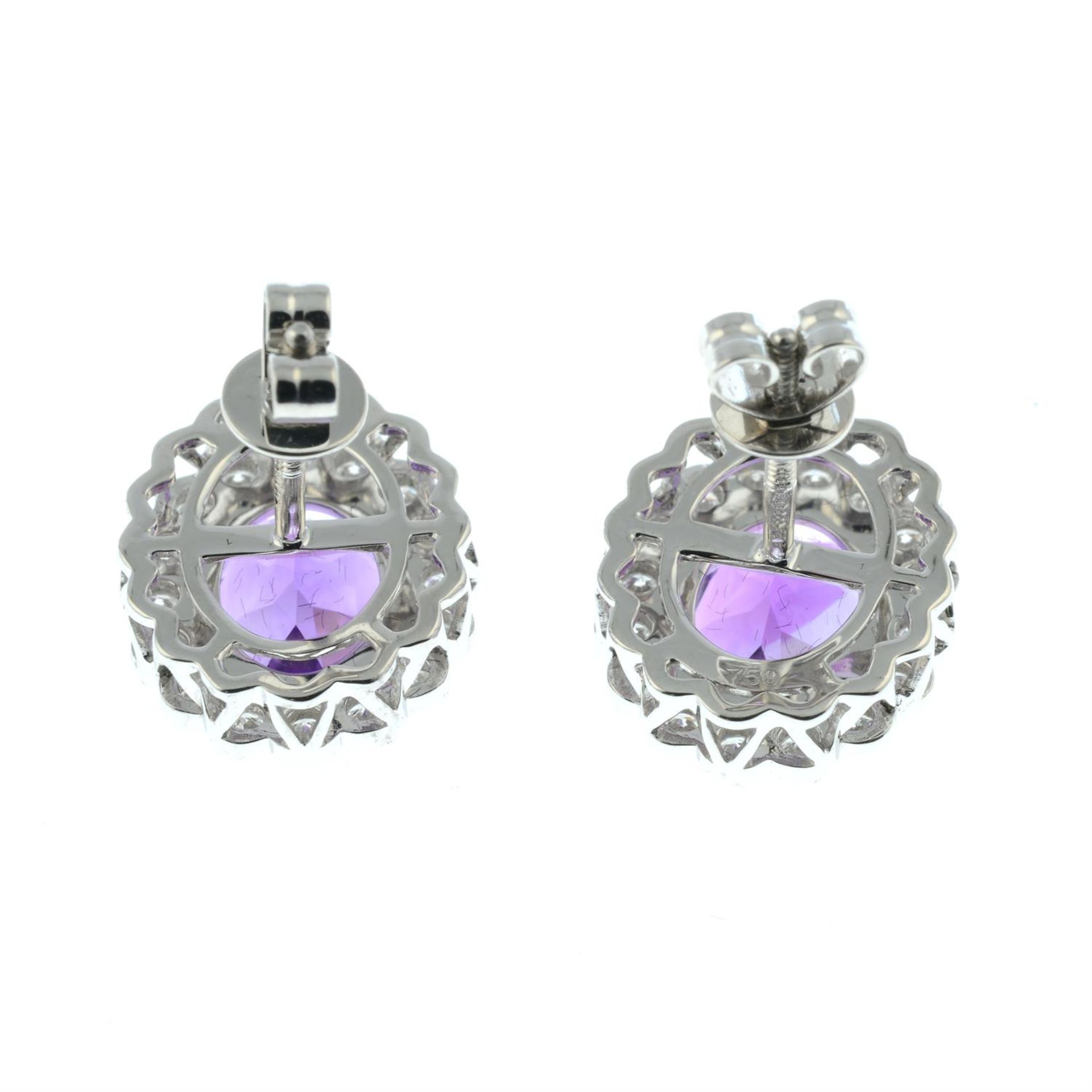 A pair of 18ct gold amethyst and brilliant-cut diamond cluster earrings. - Image 3 of 3