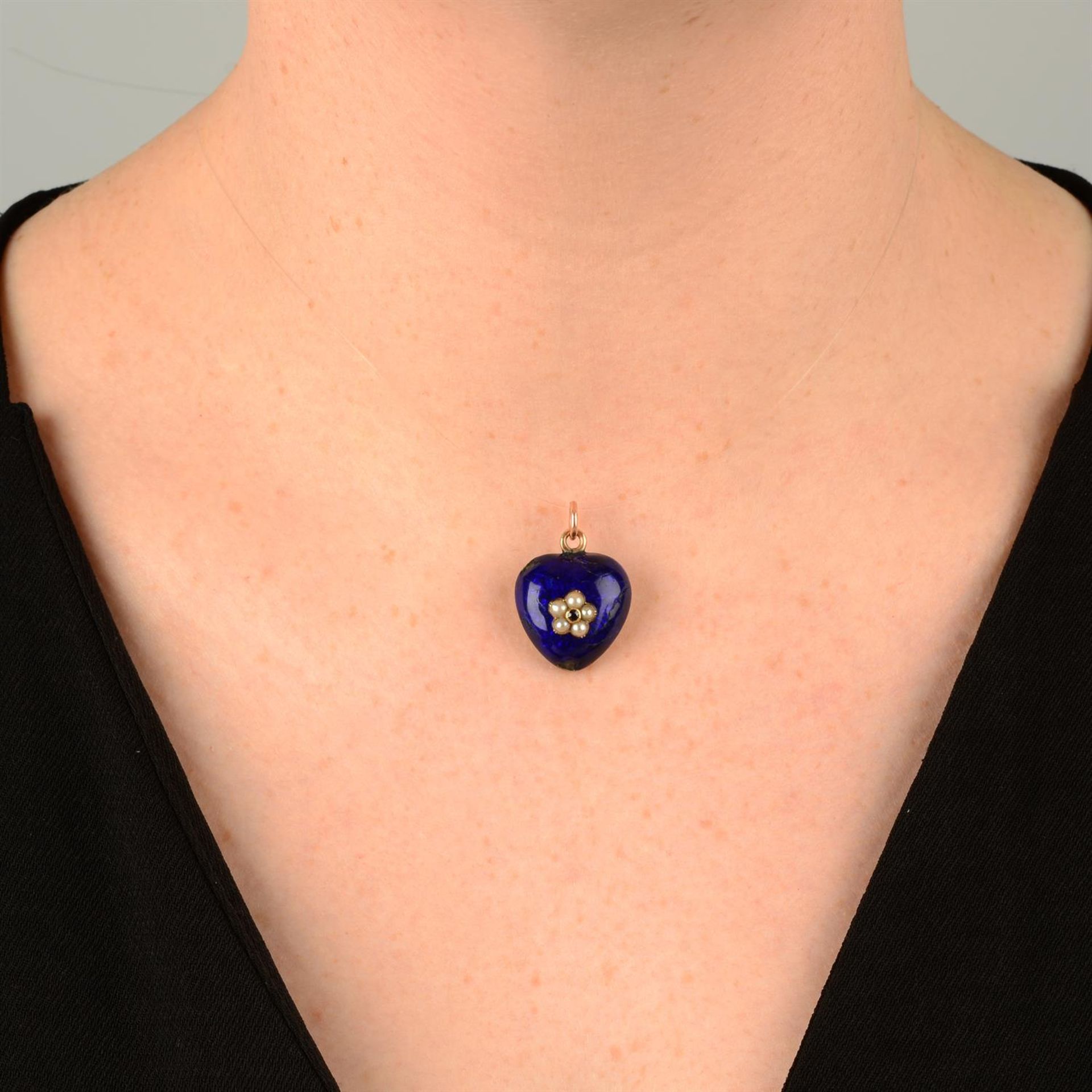 A 19th century gold, garnet and split pearl floral accent blue enamel heart locket. - Image 4 of 4