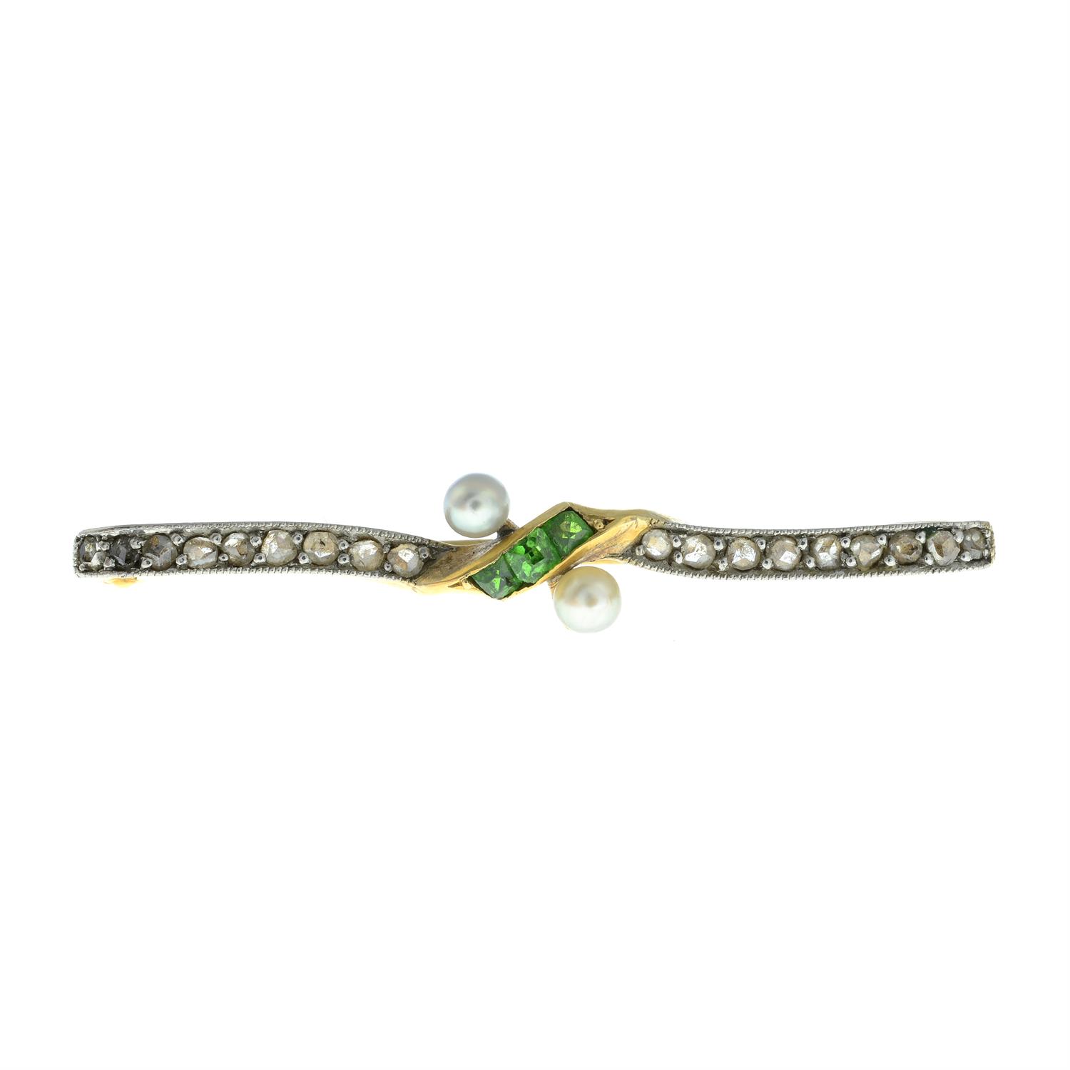 An early 20th century 18ct gold demantoid garnet, seed pearl and rose-cut diamond bar brooch. - Image 2 of 4