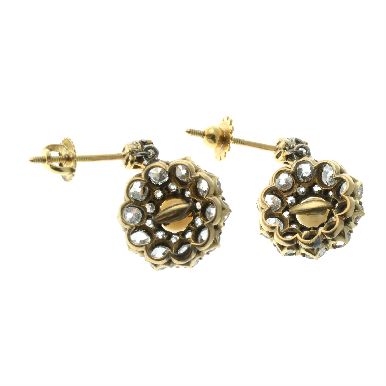 A pair of late 19th century gold old-cut diamond and pearl cluster earrings. - Image 3 of 3