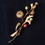 A Pre-Revolutionary Russian gold red spinel and demantoid garnet floral brooch.