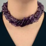 A vari-tone faceted amethyst bead torsade necklace, by Kiki McDonough.