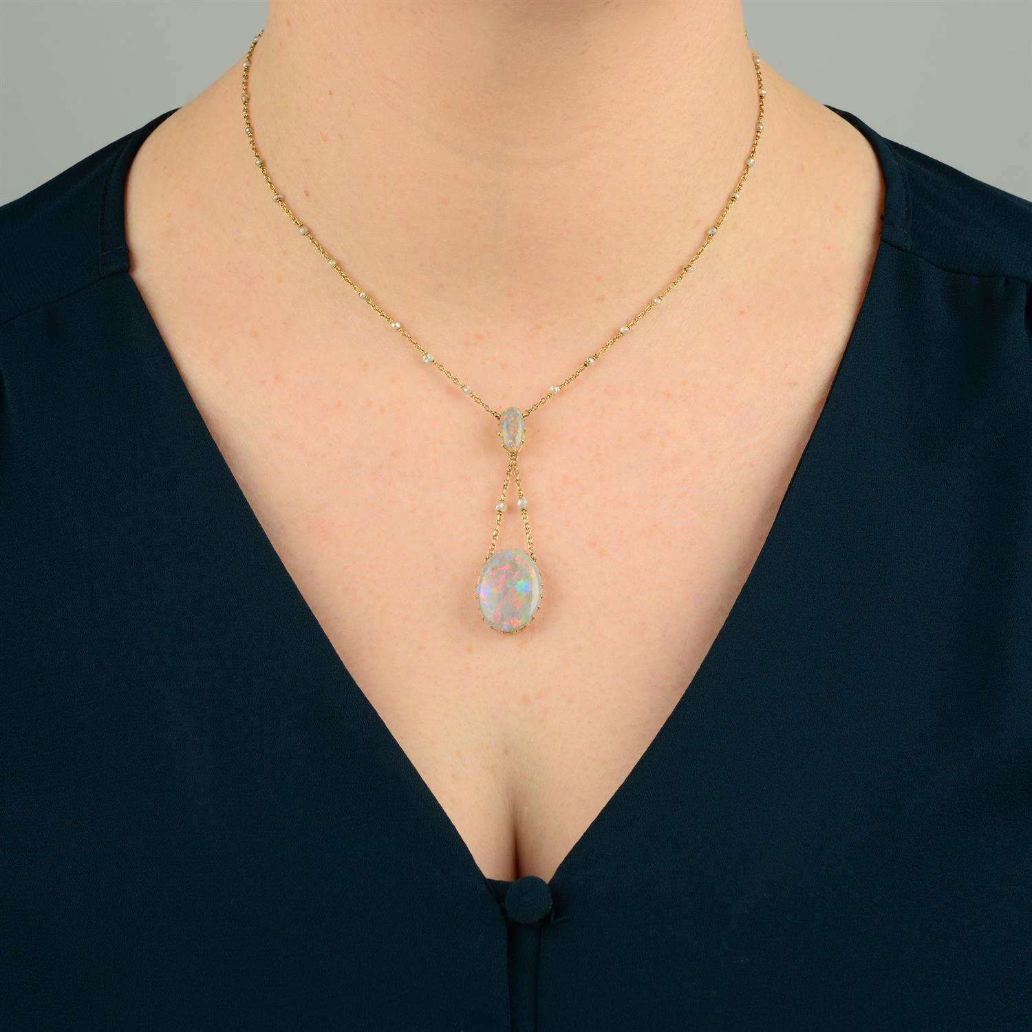 An early 20th century 14ct gold opal necklace, with seed pearl spacer trace-link chain. - Image 5 of 5