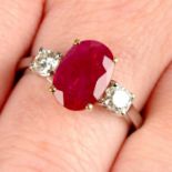 An 18ct gold ruby and brilliant-cut diamond three-stone ring.