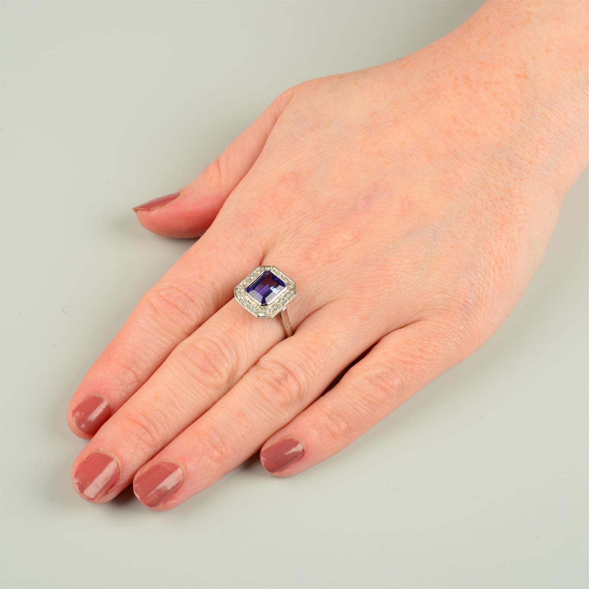 A tanzanite and brilliant-cut diamond cluster ring. - Image 5 of 5