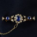 A late Victorian 15ct gold sapphire and old-cut diamond floral bar brooch.