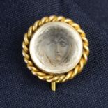 A late Victorian gold rock crystal cameo stickpin, carved to depict the head of Medusa.