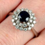 A sapphire and brilliant-cut diamond cluster ring.