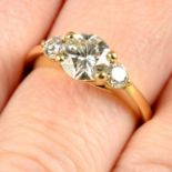 An 18ct gold brilliant-cut diamond single-stone ring, with similarly-cut diamond shoulders.