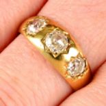 A mid Victorian 18ct gold old-cut diamond three-stone band ring.