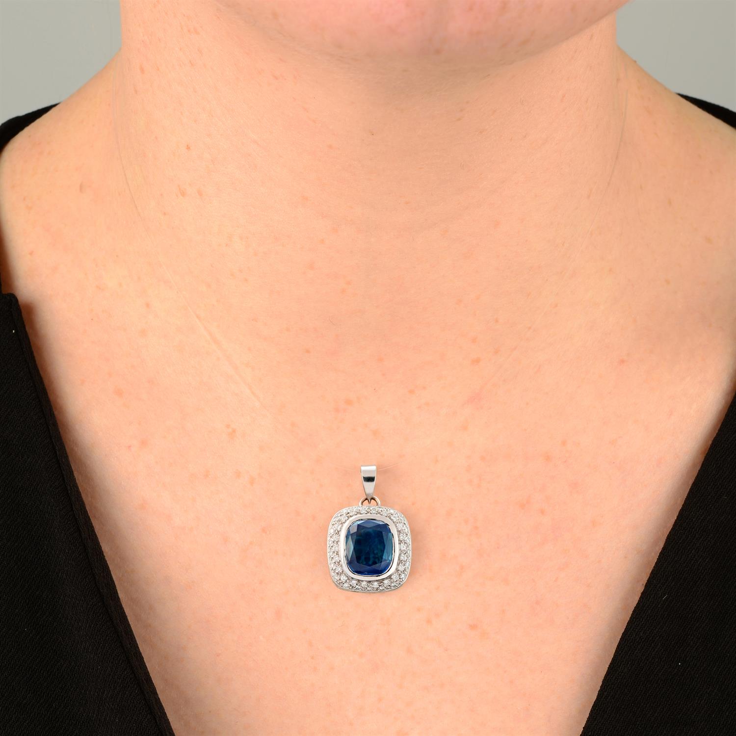 A Sri Lankan sapphire and pavé-set diamond pendant. - Image 5 of 5
