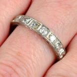 A mid 20th century platinum brilliant-cut diamond eternity ring.