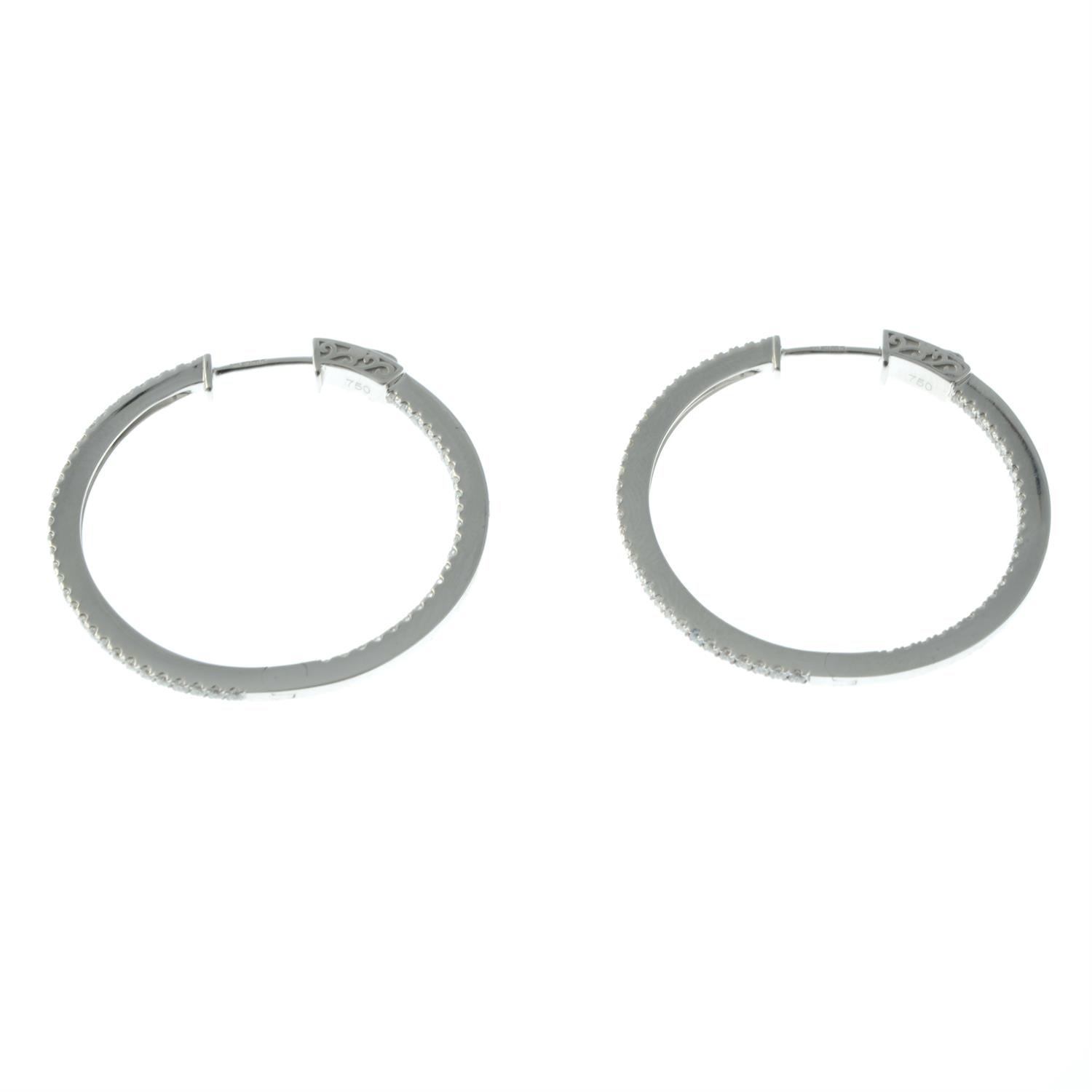 A pair of 18ct gold brilliant-cut diamond hoop earrings. - Image 3 of 3