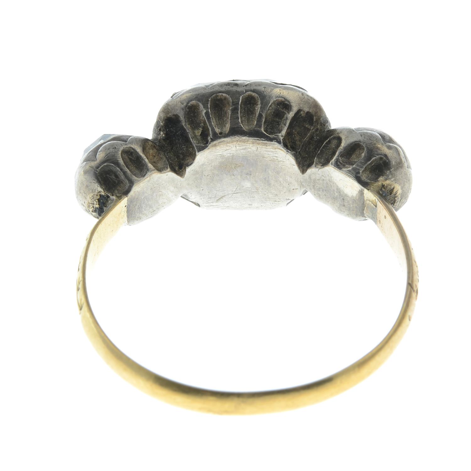 A 17th to 18th century silver and gold foil back rock crystal three-stone ring, with traces of - Image 4 of 5