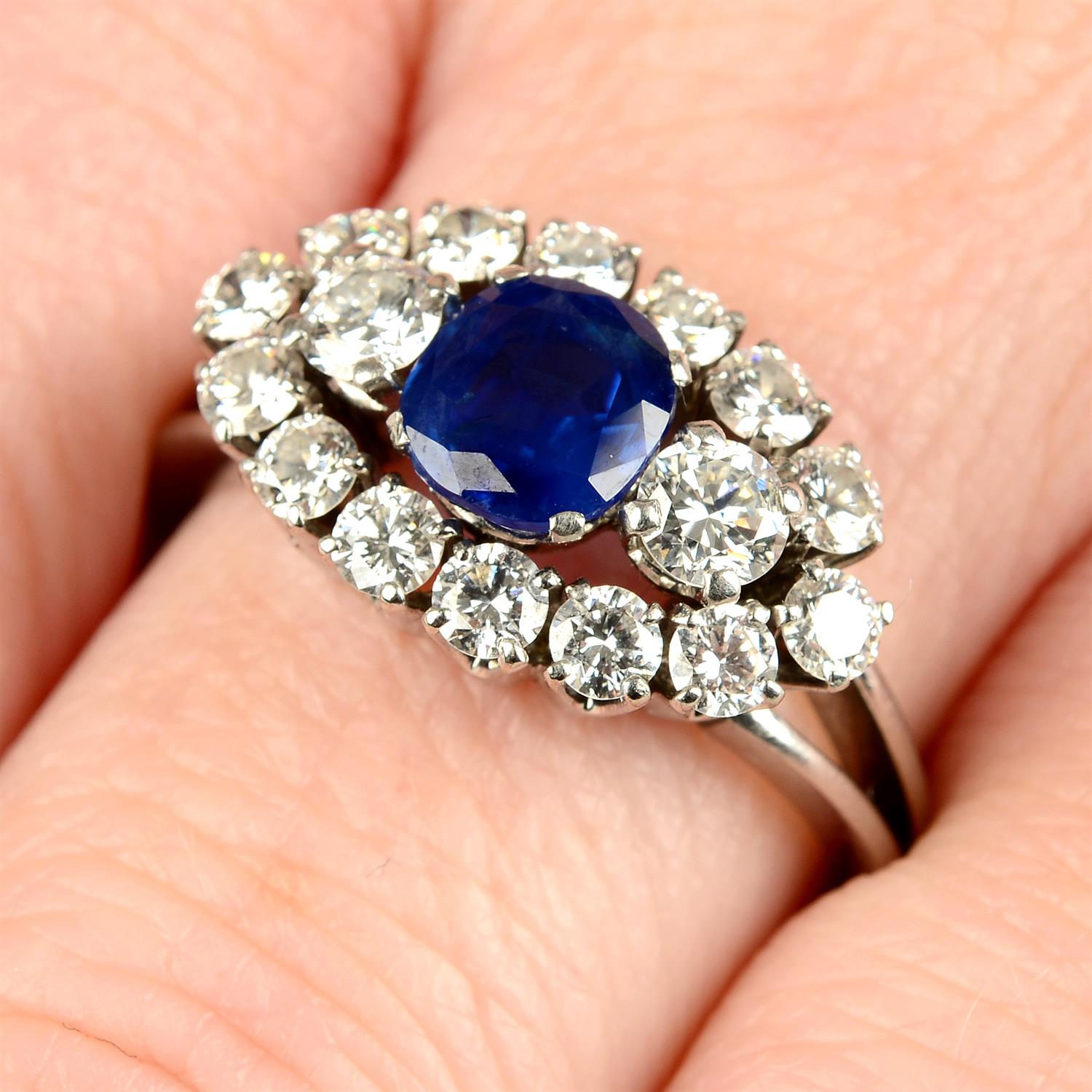A Basaltic sapphire and brilliant-cut diamond dress ring.